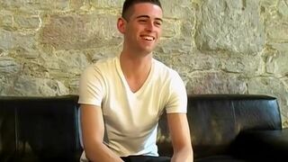 Inked British twink Joseph beating his meat after interview