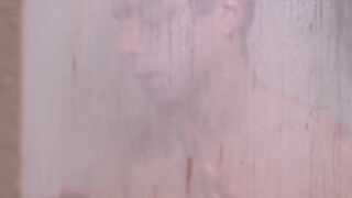 Young Mormon jerks off watching his lover under the shower