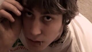 Pierced twink Carl Alexander strokes his dick while smoking