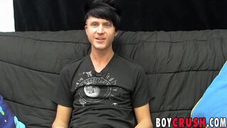 Young gay man jerks off his giant dick during an interview