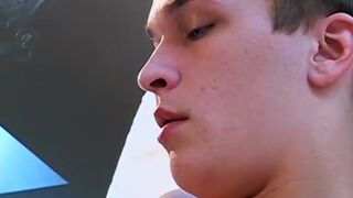 Amateur Adam smokes and cums in his own hand solo