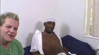 Blonde guy does terrible blowjob on a black cock