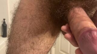 Close-up oiling and jerking off my very hairy big uncut cock