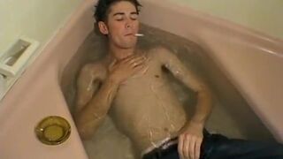 Young smoker launches jizz over freshly washed body solo